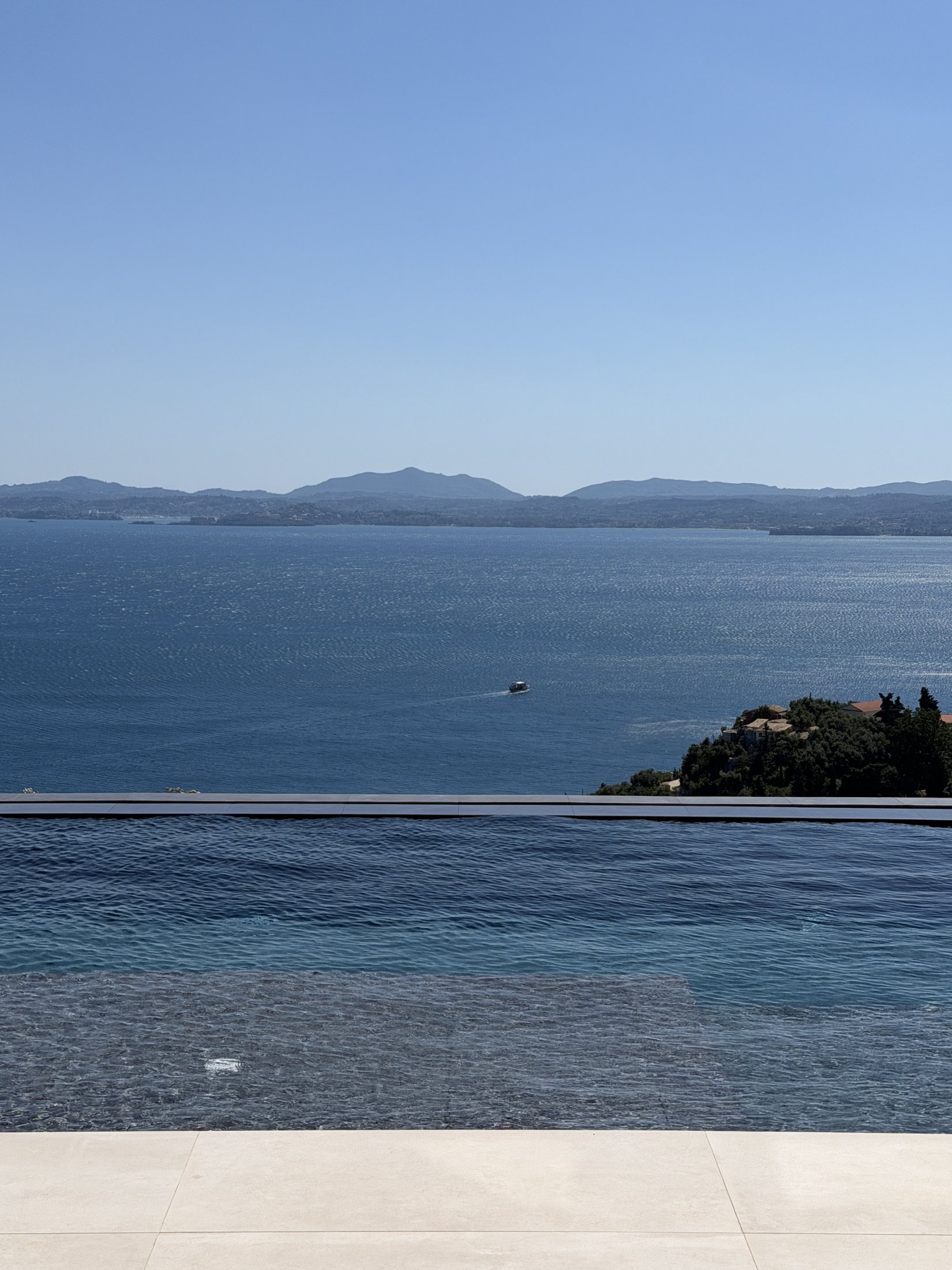 An infinity pool overlooking the Greek sea
